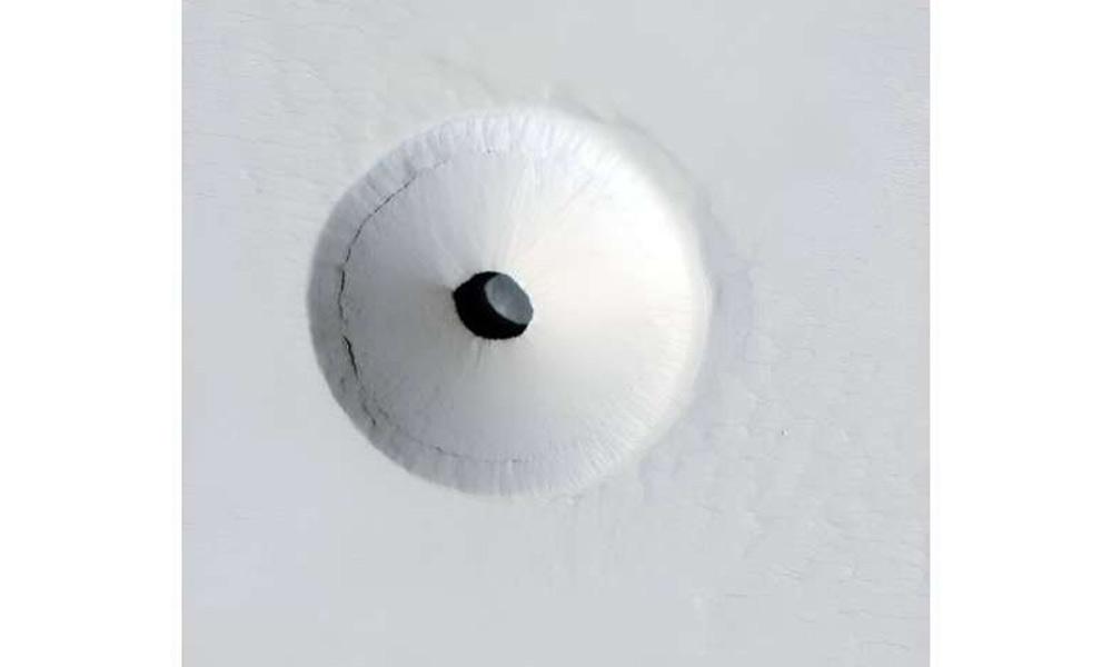 美國太空總署火星勘測軌道飛行器上的 HiRISE 相機拍攝的火星帕沃尼斯蒙斯火山熔岩管天窗入口